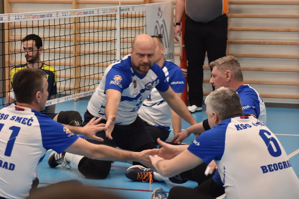 KSO Smeč players huddling on court during a EuroLeague tournament